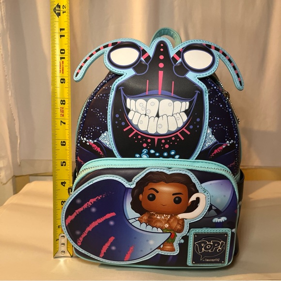 NWOT Loungefly Disney Maui/Tamatoa  Faux Leather Mini Backpack. Glow In The Dark - Picture 12 of 16
